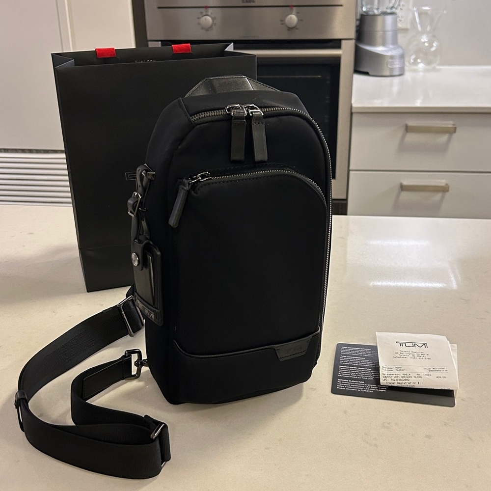 TUMI Black Belt Bag for Men nylon & leather comes with receipt, garment bag,